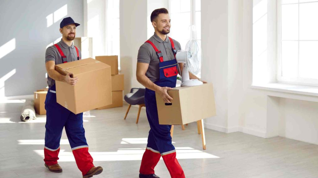 Two men carrying boxes | The Moving Company Gold Coast